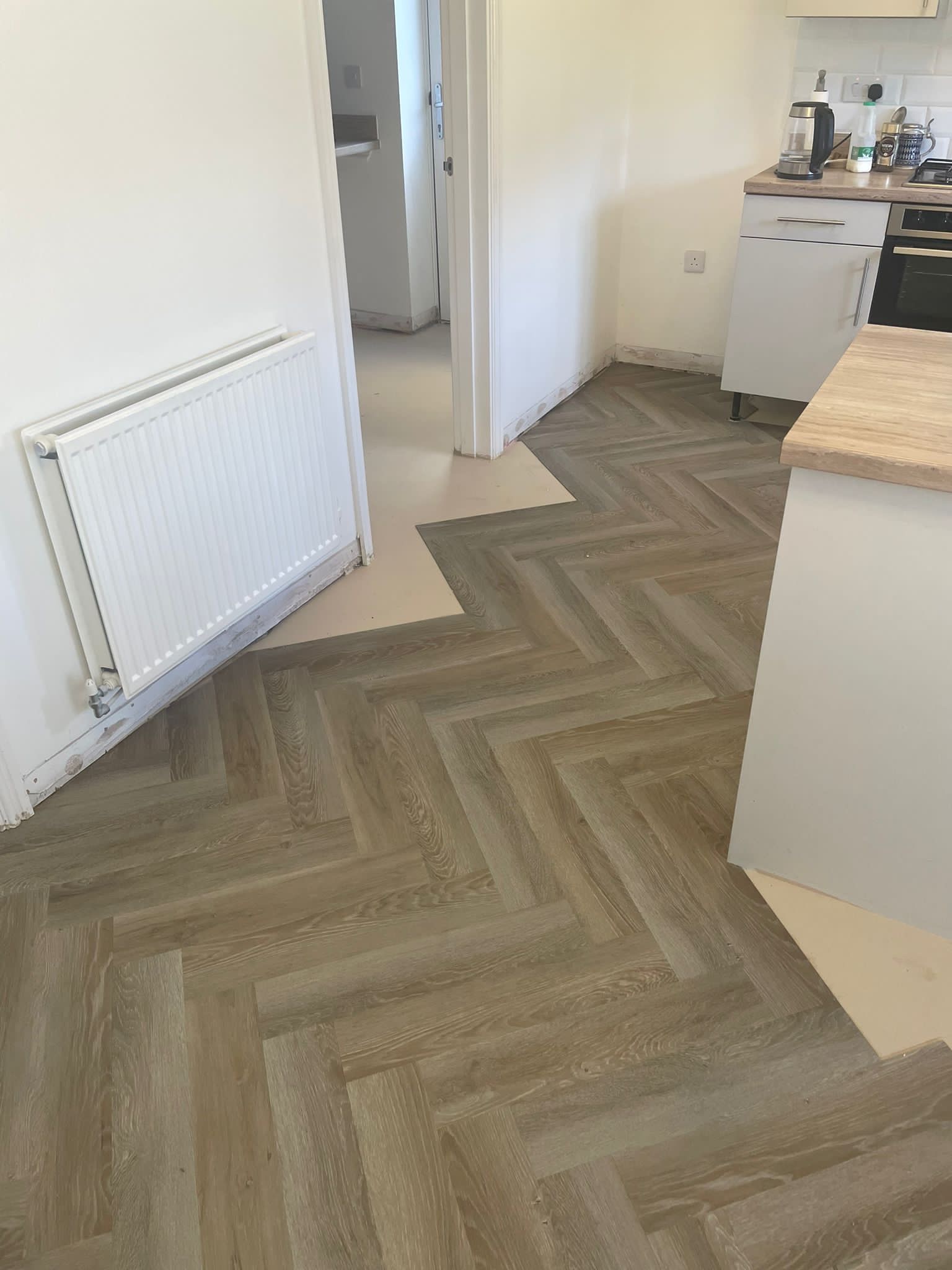 Elevate Your Home with Herringbone LVT Flooring: A Stunning Choice for this Colne Property